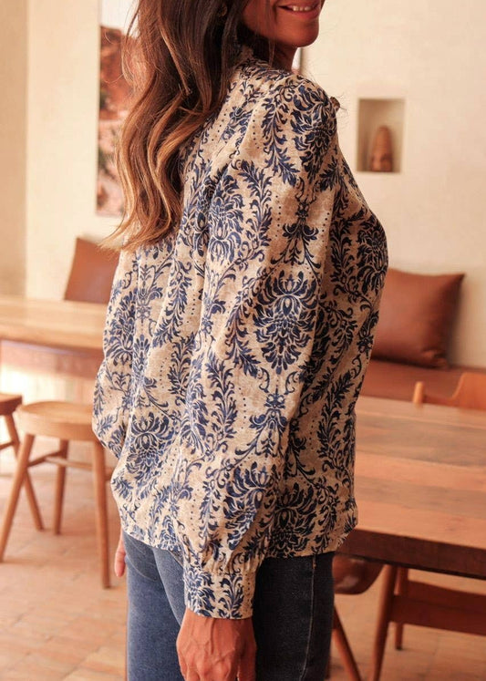 🌺 Boho Bloom: Ethnic Floral Ruffle Blouse