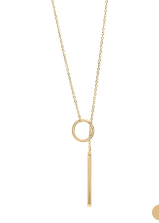 Gold necklace with circular pendant and dangling bar on a white background