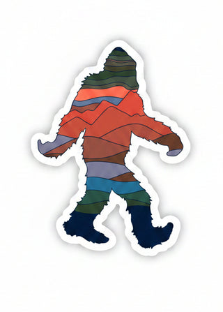 Colorful silhouette of a bigfoot-like creature on a white background