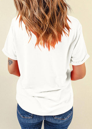Model wearing white Americana sequin star tee with denim jeans
